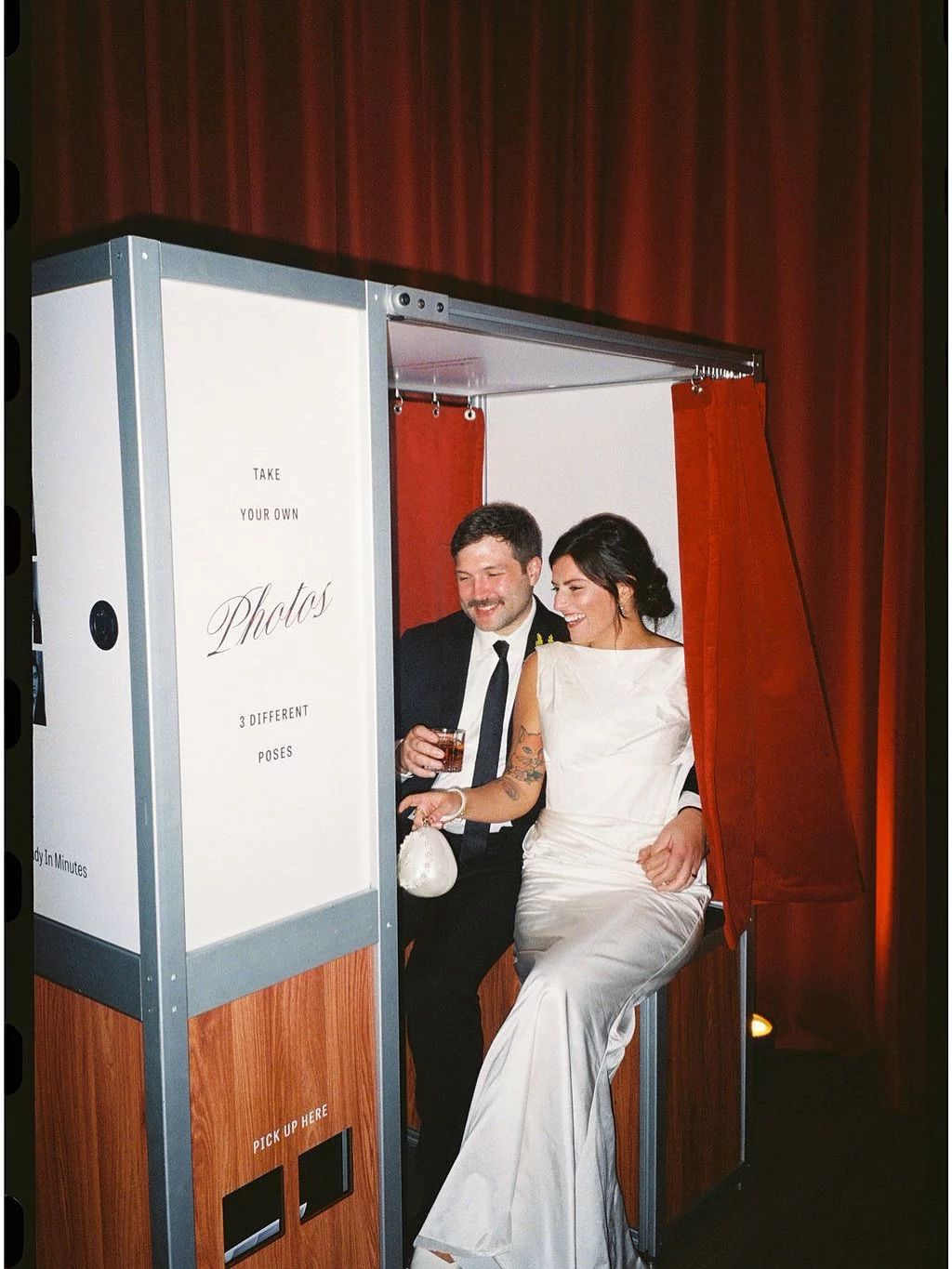 Elegant guests interacting with Luxxora Booths